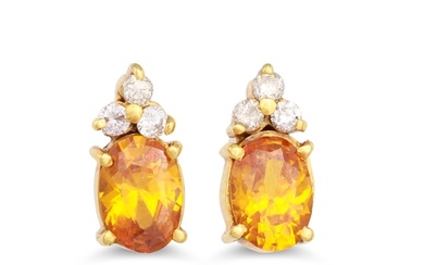 A PAIR OF DIAMOND AND YELLOW SAPPHIRE EARRINGS, the oval sap...
