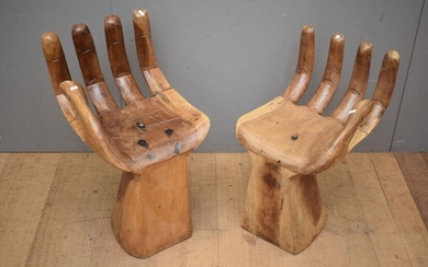 A PAIR OF HAND SHAPED TEAK CHAIRS (A/F) - SIGNS OF REPAIR) (63H x 36W x 43D CM) (LEONARD JOEL DELIVERY SIZE: MEDIUM)