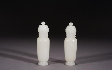 A PAIR OF WHITE JADE VASES AND COVERS