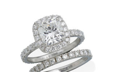 A PLATINUM AND DIAMOND RING, TOGETHER WITH A MATCHING DIAMOND BAND