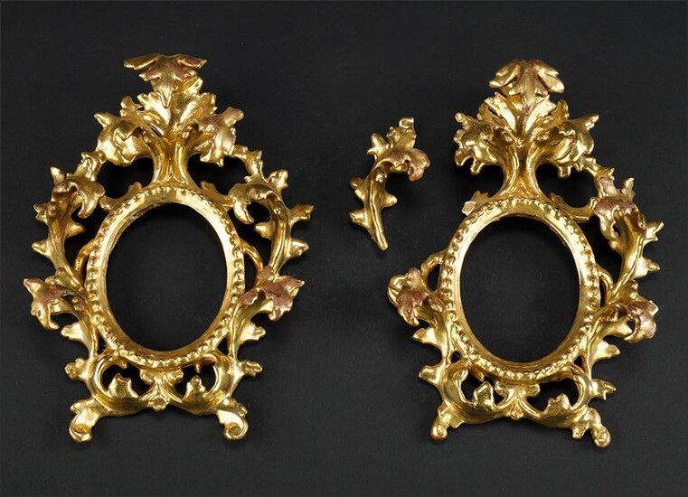 A Pair of Baroque Style Gilt Wood Frames.