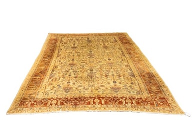 A Persian Tabriz carpet 10'8" x 15'9"