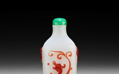 A RED OVERLAY WHITE GLASS 'CHILONG' SNUFF BOTTLE
