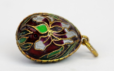 A Russian silver gilt egg shaped pendant, S. 2.5cm.