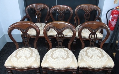 A Set of Six XIX Century Style Carved Hardwood Dining Chairs...