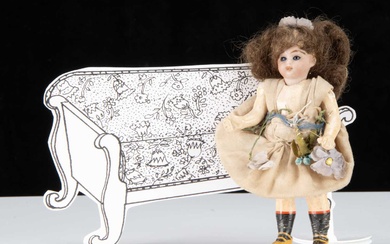 A Simon & Halbig bisque headed dolls’ house doll dressed as a flower fairy
