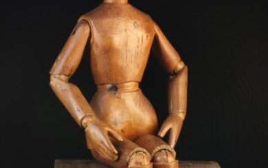A Small Late 19th Century Pine Lay Figure with articulated limbs and body, a carved face, hands and