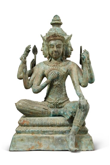 A Thai bronze figure of an eight-armed seated Deity Modern