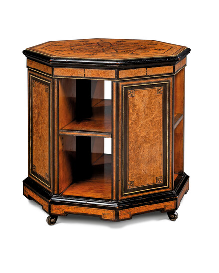 A VICTORIAN BRASS-MOUNTED AMBOYNA, EBONY, EBONISED AND MARQUETRY OCTAGONAL BOOKSTAND