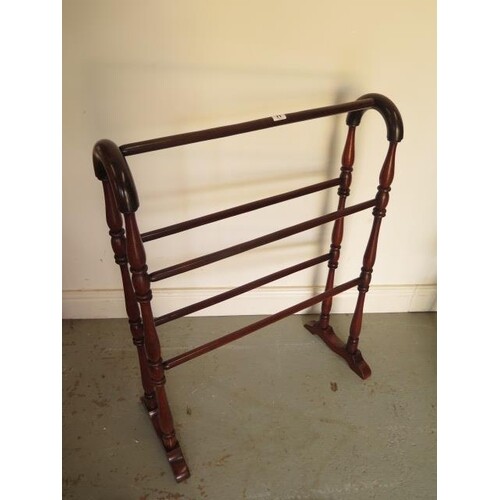 A Victorian mahogany towel rail in clean polished condition,...