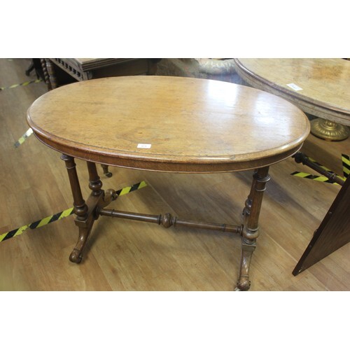 A Victorian oak and simulated elm oval occasional table, wit...