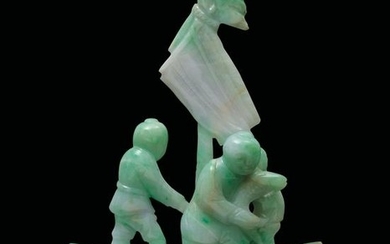 A carved jadeite group, China, early 1900s