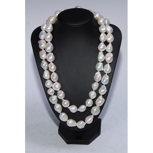 A diamond and free form two strand pearl necklace, composed ...