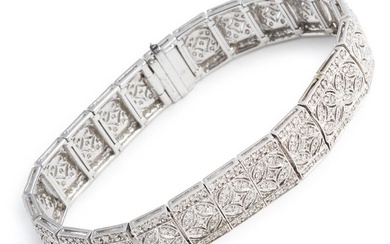 A diamond bracelet in Art Deco style set with numerous brilliant-cut diamonds weighing a total of app. 3.67 ct., mounted in 18k white gold. Colour: Top Wesselton-Wesselton (G-H). Clarity: VS2-SI. L. 17 cm.
