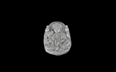A finely carved jade amulet of the seated goddess Guanyin holding a ruyi, W. 4cm.