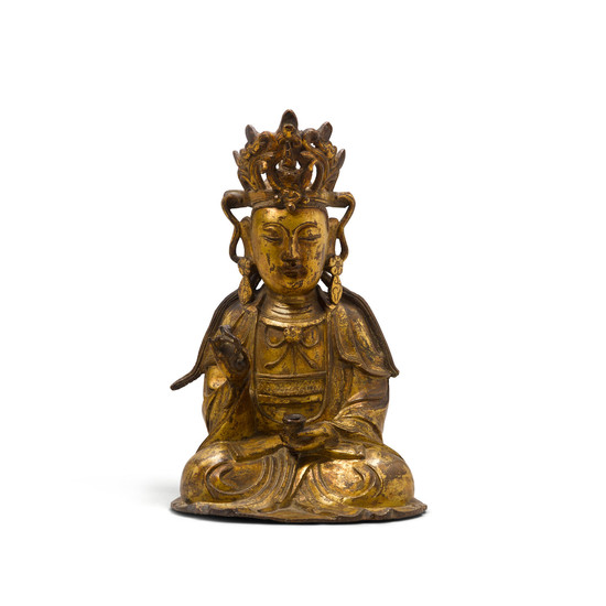 A gilt bronze figure of a seated bodhisattva