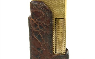 A gold plated Dunhill lighter
