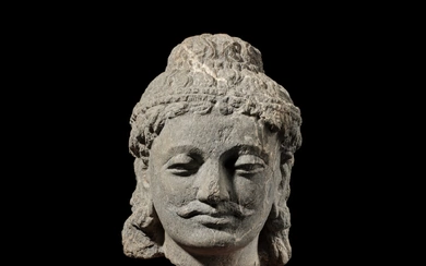 A gray schist head of a Bodhisattva, Ancient Region of Gandhara, 3rd / 4th century