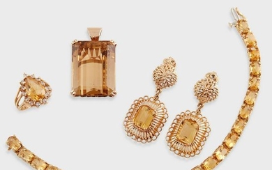 A group of citrine and fourteen karat gold jewelry