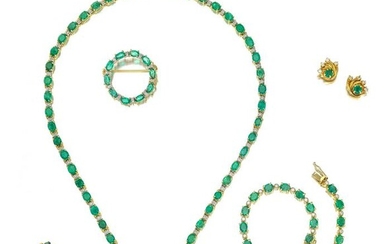 A group of emerald and diamond jewelry