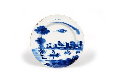 A large delftware plate c.1750, painted in blue...
