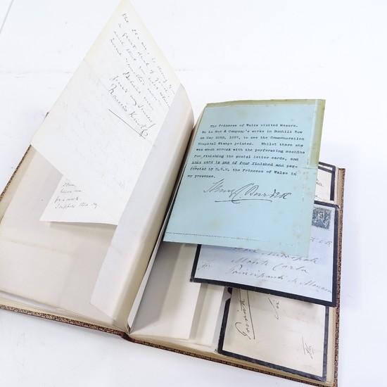 A leather-bound album containing autograph letters etc from ...