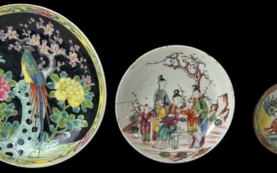 A modern Chinese black ground hand painted dish decorated with...