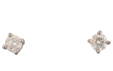 A pair of 0.32ct solitaire diamond earrings, with stud fitti...