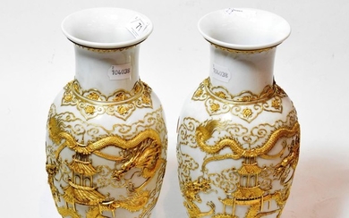 A pair of 20th century Chinese porcelain baluster vases, applied...