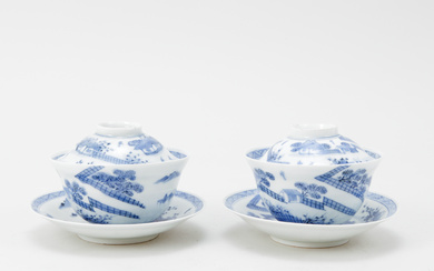 A pair of Chinese porcelain teacups with saucers and lids, 19th century.