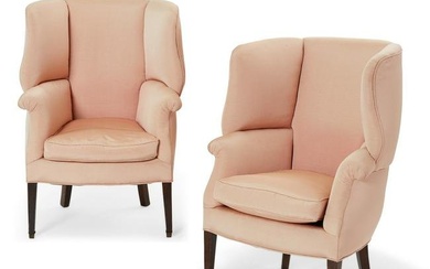 A pair of George III style barrel back armchairs