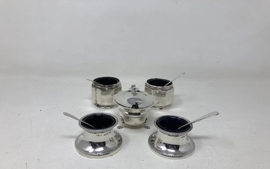 A pair of George V silver salts, with blue glass liners, ano...