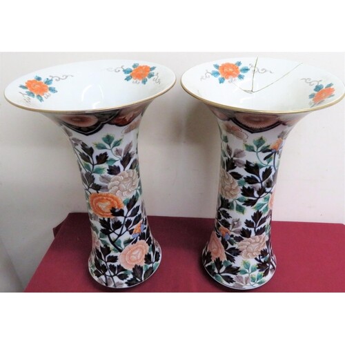 A pair of Japanese Imari pattern flared rim vases with signa...