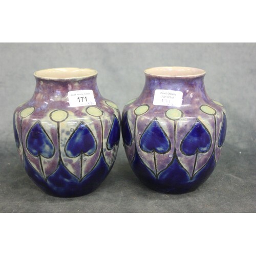 A pair of Royal Doulton stoneware vases, blue glazes, with h...