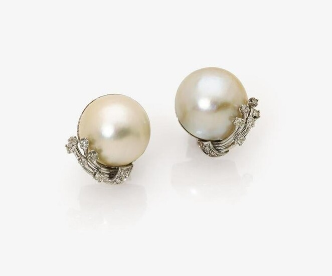 A pair of ear clips with Mabé - cultured pearls and