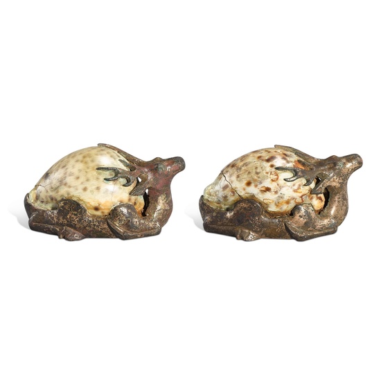 A pair of gilt-bronze and cowrie shell stag-form weights, Han...