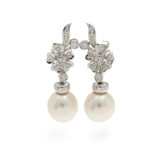 A pair of pearl and diamand ear pendants set with a cultured fresh water pearl and numerous baguette and brilliant-cut diamonds, mounted in 18k white gold. (2)