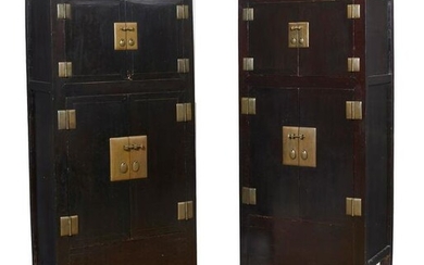 A pair of tall Chinese ebonized cabinets