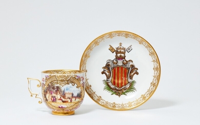 A rare Meissen porcelain cup and saucer from the armorial service for Pope Benedict XIV