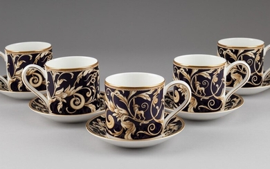 A set of five Wedgwood coffee cups and saucers in the Cornucopia pattern.