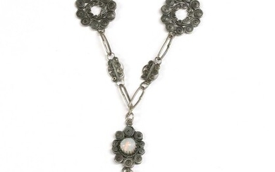 A silver opal filigree necklace