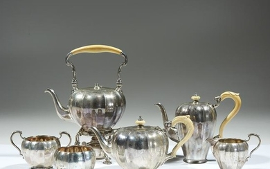 A six-piece English silver tea and coffee service with