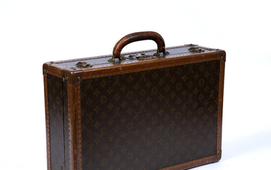 A vintage Louis Vuitton monogram small suitcase