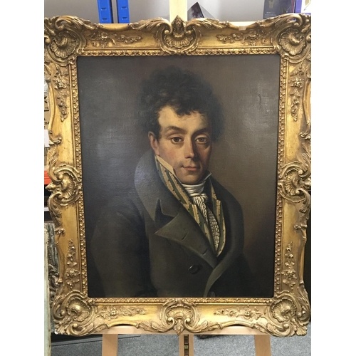 A well executed and framed early 19th oil on canvas portrait...
