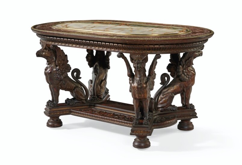 AN AMERICAN NEO-GREC PARCEL-GILT, PATINATED BRONZE, MEXICAN ONYX AND ROSEWOOD CENTER TABLE, ATTRIBUTED TO POTTIER & STYMUS (1859-1910), NEW YORK, CIRCA 1870