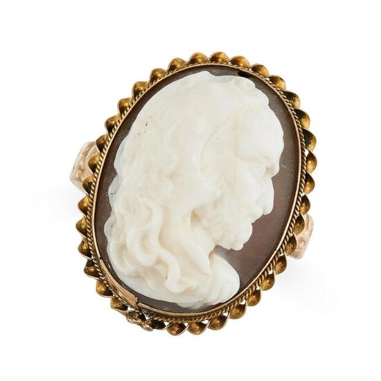 AN ANTIQUE SHELL CAMEO DRESS RING in yellow gold, set