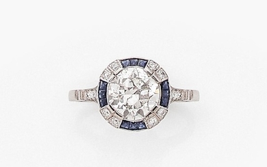 ANNEES 1930 BAGUE ENTOURAGE DIAMANT A 1,90 carat approx. diamond, sapphire and platinum ring, circa 1930.
