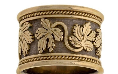An 18ct gold, vine leaf ring, by Elizabeth Gage, decorated with twin vine leaf motifs, signed Gage, British hallmarks for 18-carat gold, London, ring size N, width 1.5cm, Elizabeth with Gage suede pouch