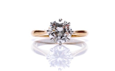 An 18ct hallmarked diamond solitaire ring, brilliant cut cla...