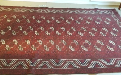 NOT SOLD. An Afghan carpet, classical gül design. C. 1940. 335 x 220 cm. – Bruun Rasmussen Auctioneers of Fine Art